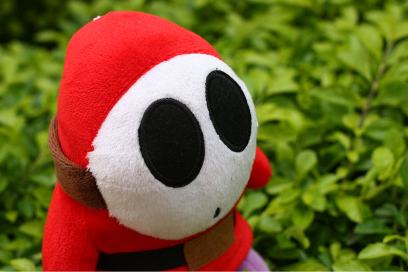 orange shy guy plush