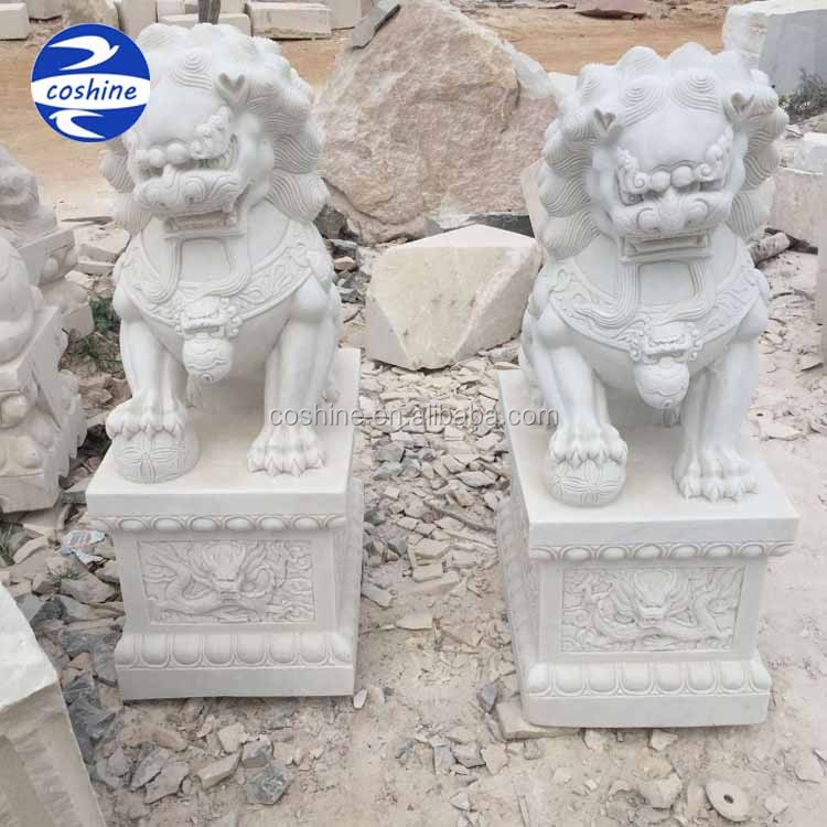 white foo dog statues