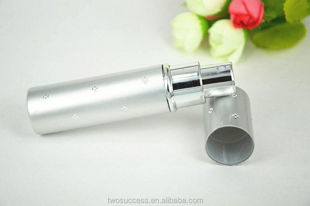 small aluminum perfume bottle .jpg