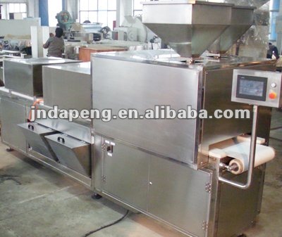 Chocolate enrobing machine