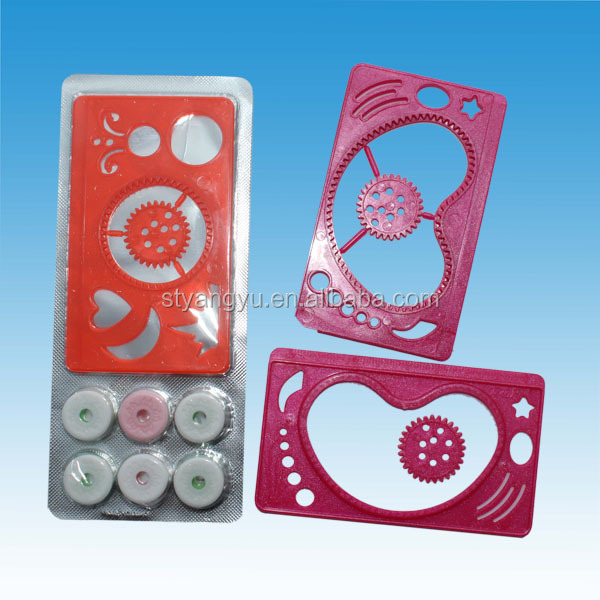Plastic spirograph with candy