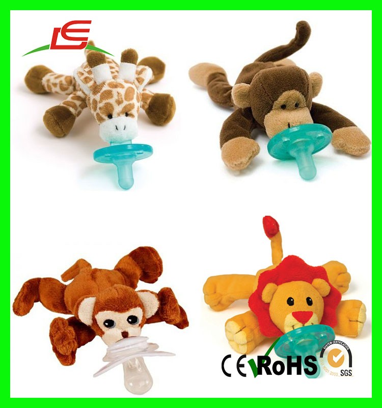 stuffed monkey with pacifier