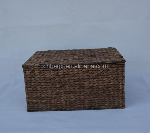 of 3 rectangular brown handwoven water hyacinth storage trunks