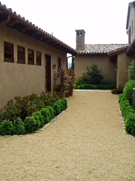 Charming-Decorative-Pea-Gravel-With-Gravel-around-the-outside-Wall-Lamp-Windows-Trim.jpg